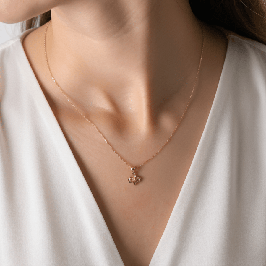 Woman wearing 14ct Gold Scottish Jewellery Small Thistle Pendant by Kolié Fine Jewellery