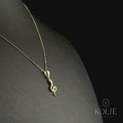 Kolié 9ct yellow gold necklace with a snake with a pendant with cubic zirconia eyes