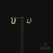 Kolié 9ct yellow gold bar earrings with sapphire blue and clear cubic zirconia stones in an alternating pattern