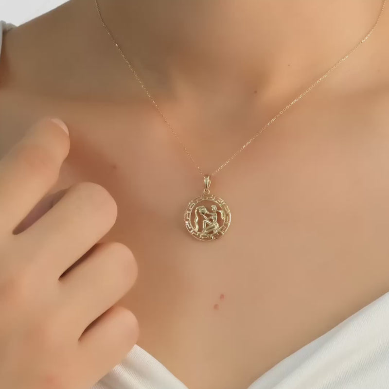 Video of 14ct gold zodiac pendant worn of woman
