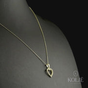 Kolié 9ct yellow gold heart frame pendant with a cubic zirconia halo